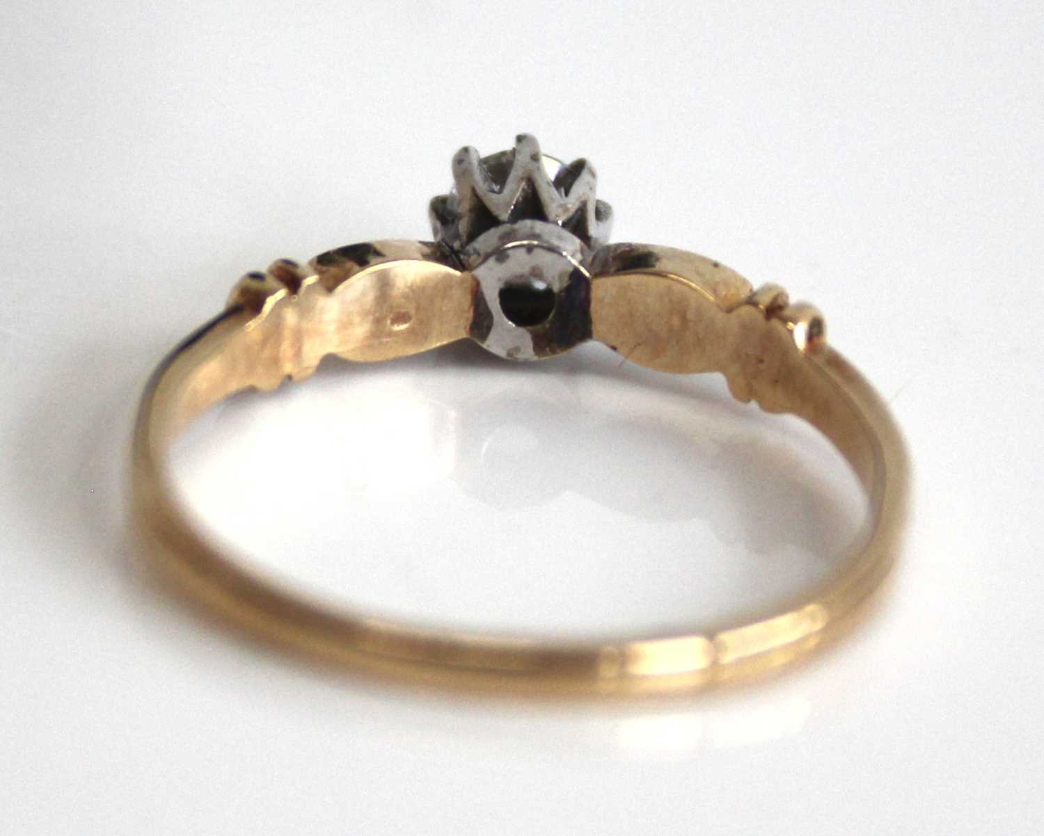 A 9ct gold diamond solitaire ring, the claw set round brilliant weighing approx 0.2 carats, 1.7g, - Image 4 of 7