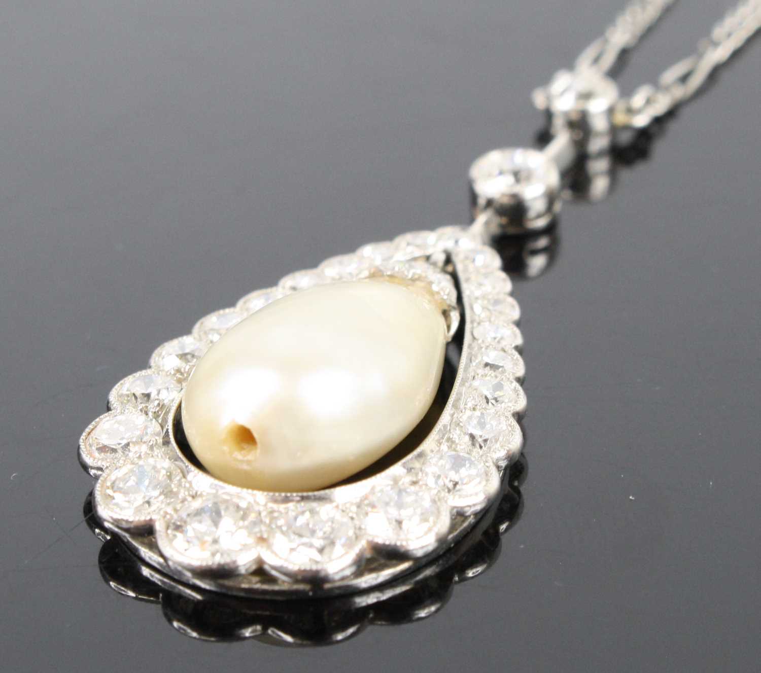 A white metal articulated pearl and diamond pear shaped cluster pendant, comprising a 16.5 x 10.15mm - Image 2 of 14