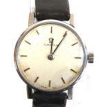A lady's Omega stainless steel manual wind wristwatch with round white baton dial, fitted to an