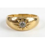 An 18ct yellow gold late Victorian diamond dress ring, having an Old European cut diamond in a