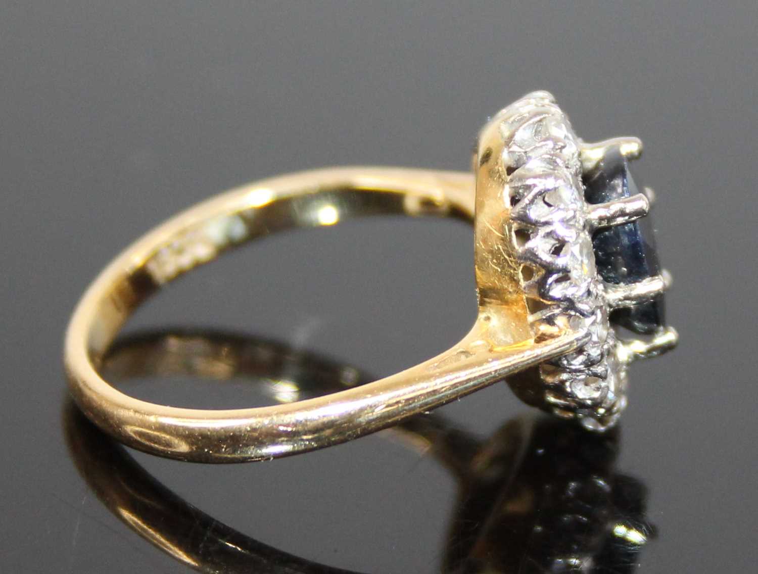 A yellow and white metal, sapphire and diamond oval cluster ring, the centre sapphire within a - Image 3 of 7