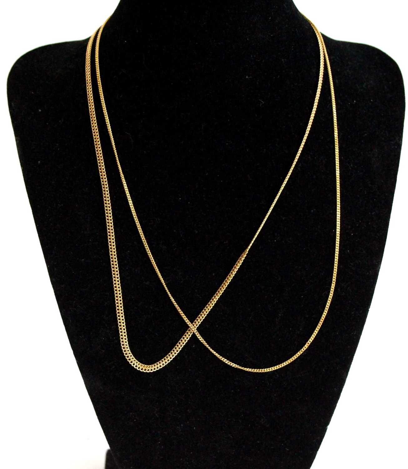 A 9ct gold fancylink neck chain, length 44cm; together with a fine curblink neck chain, length 44cm,