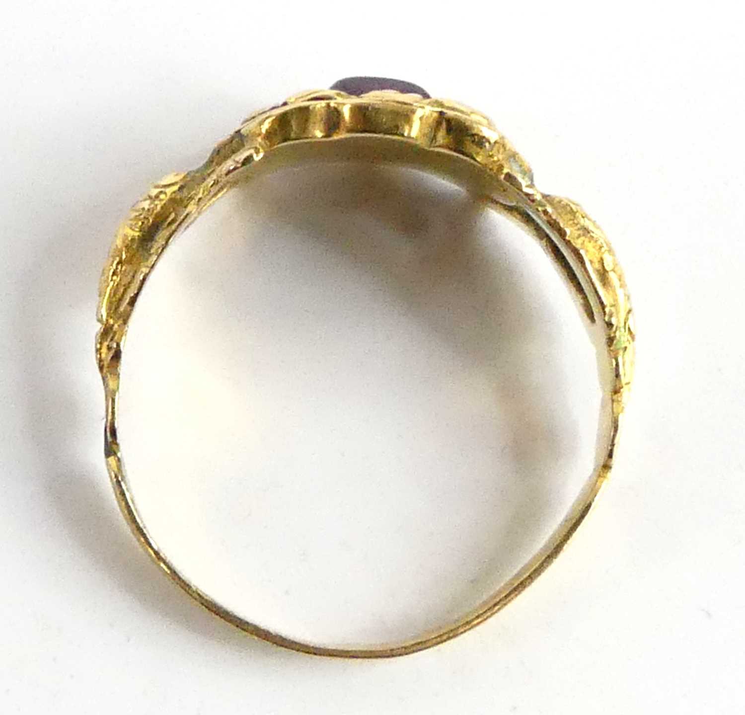 A yellow metal 19th century memorial ring, having a 4.2mm x 2.7mm rectangular garnet cabochon within - Image 5 of 6