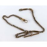A yellow metal Albert chain with alternating oval belcher, trombone and mariner link, with T bar and