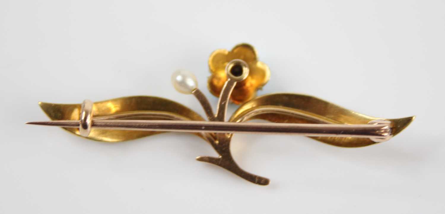 A yellow metal, seed pearl, turquoise and diamond set leaf and flower bar brooch, the flower centred - Image 3 of 3