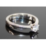 An 18ct white gold diamond solitaire ring, featuring a round brilliant cut diamonds in a six-claw