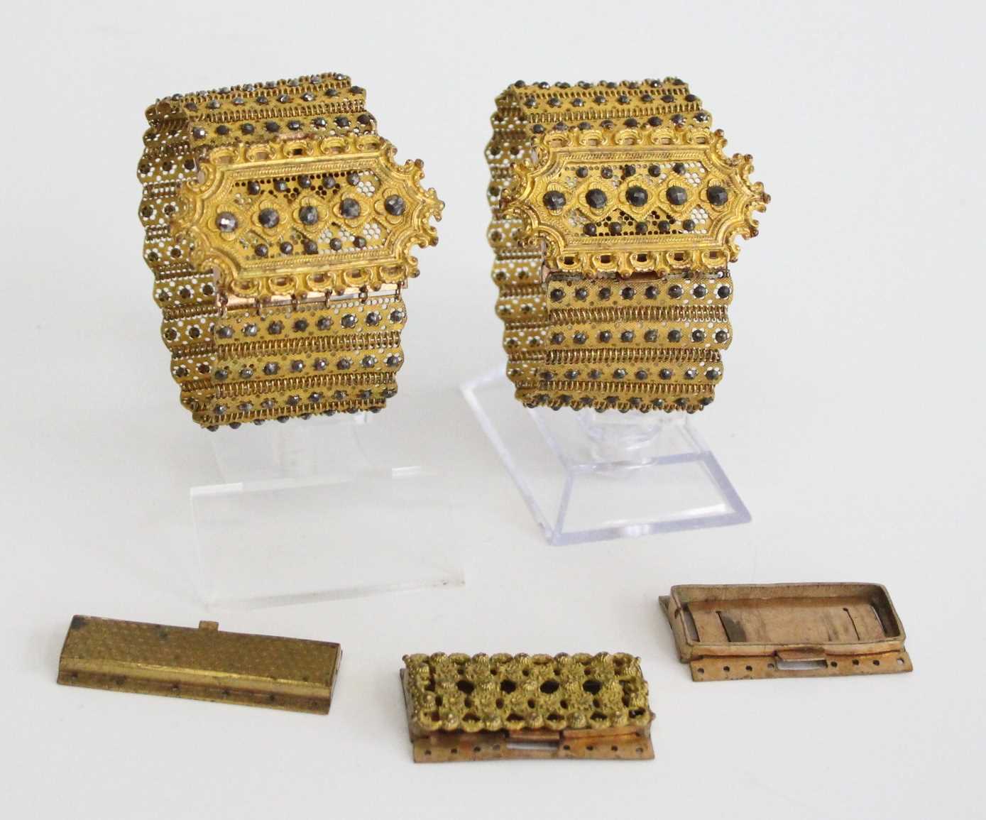 A pair of Victorian gilt metal and polished steel bracelets, each comprising of nineteen sections