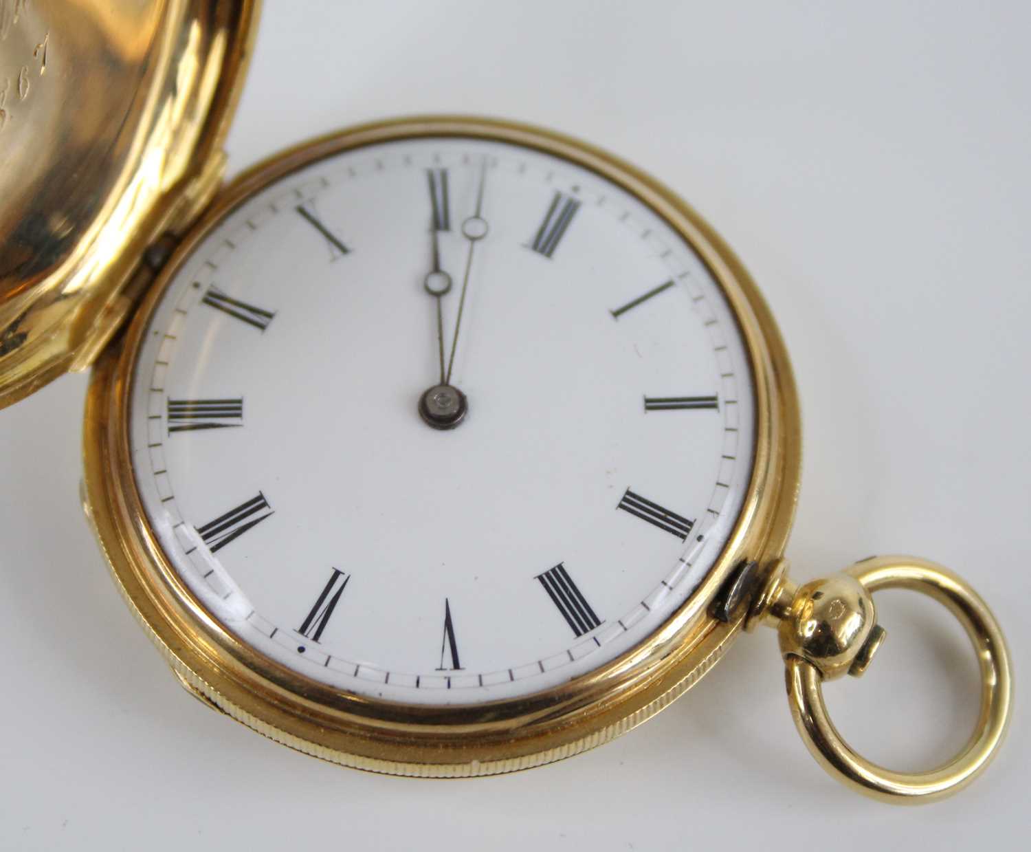 A 18ct gold lady's full hunter keywind pocket watch, having engraved case and white Roman dial, - Image 5 of 10