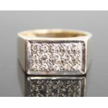 A 9ct yellow and white gold diamond rectangular signet ring with 15 round brilliant cut diamonds