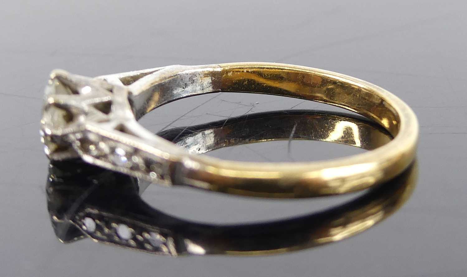 A yellow and white metal, diamond solitaire ring, featuring a round brilliant cut diamond in an - Image 5 of 7
