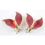 A pair of David Andersen silver-gilt and red enamel ear clips, fashioned as twin adjoined leaves,
