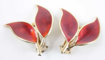 A pair of David Andersen silver-gilt and red enamel ear clips, fashioned as twin adjoined leaves,