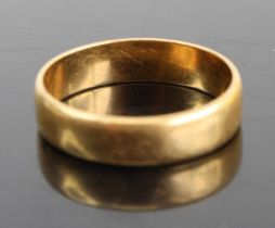 An 18ct gold wedding band, sponsor PP&P, London 1958, 3.2g, size M/N