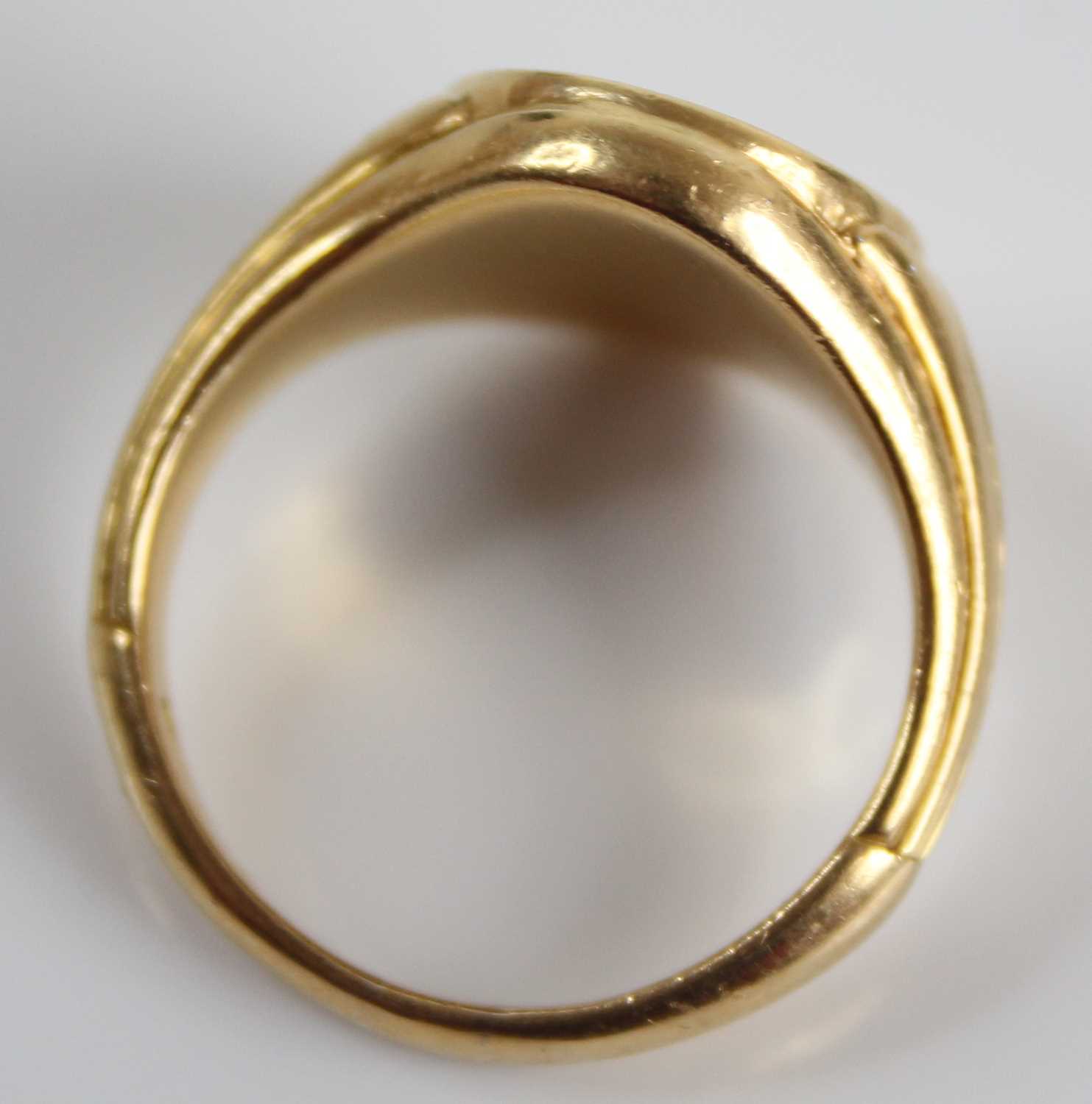 A yellow metal gent's signet ring, the oval top signed Steve, with tapering fluted shoulders, - Image 5 of 6