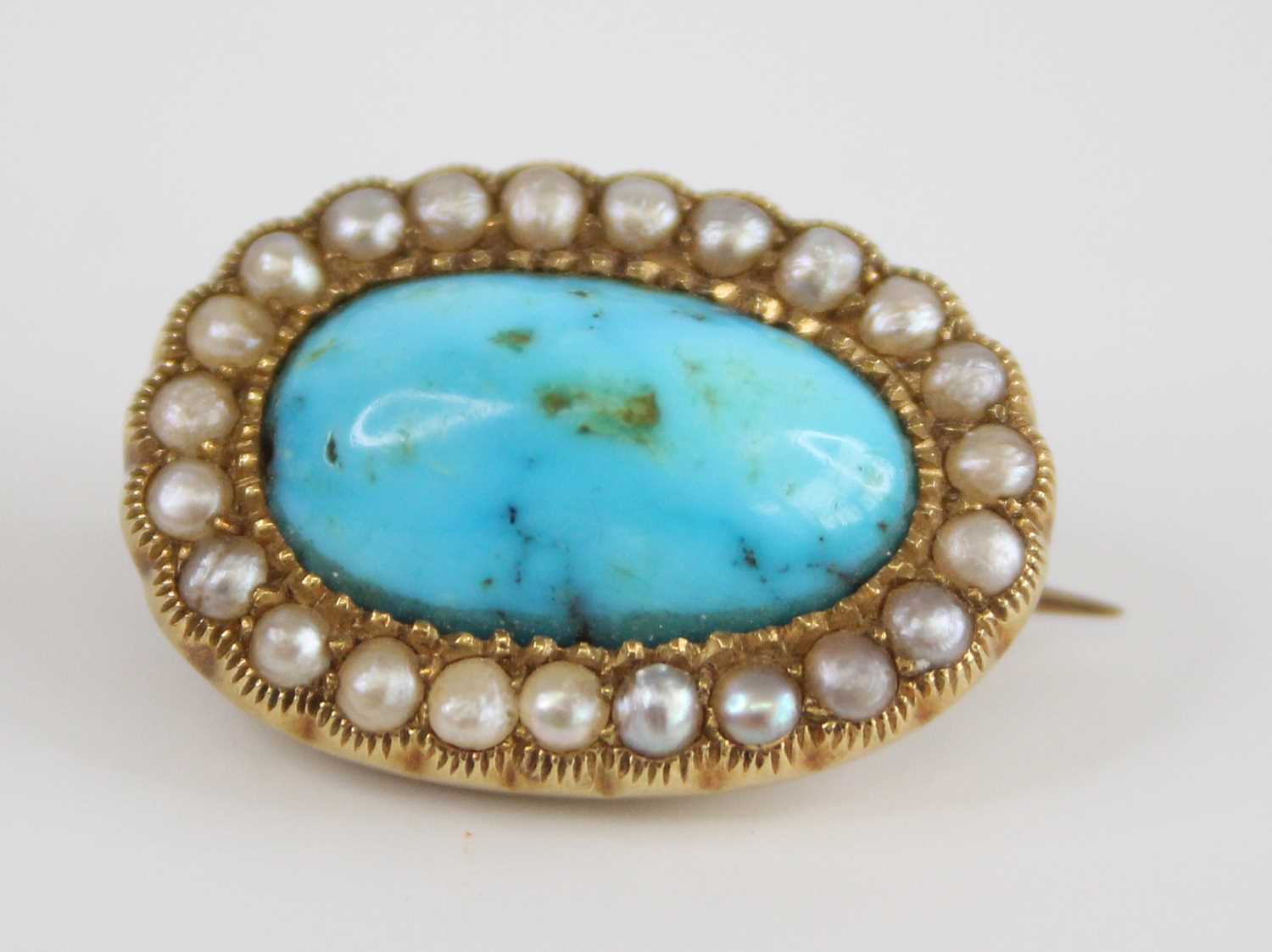 A yellow metal, turquoise and pearl oval cluster brooch, comprising a centre 14.78 x 9 x 5.55mm oval - Image 5 of 5