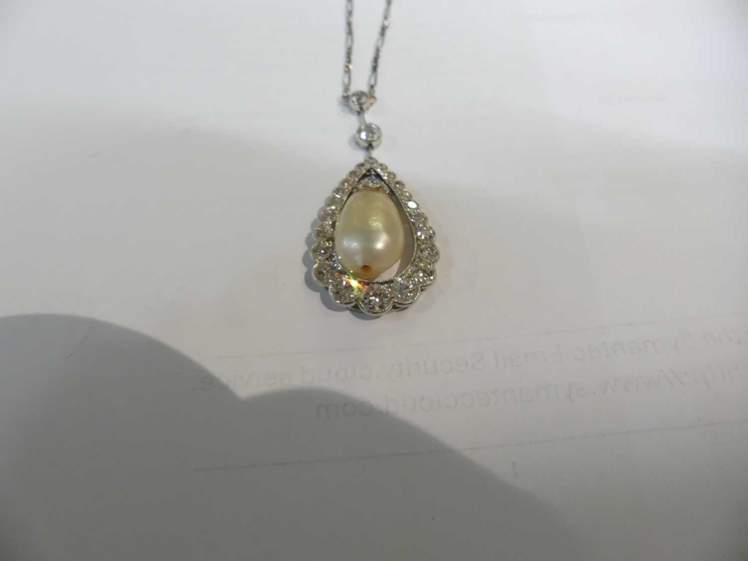A white metal articulated pearl and diamond pear shaped cluster pendant, comprising a 16.5 x 10.15mm - Image 9 of 14