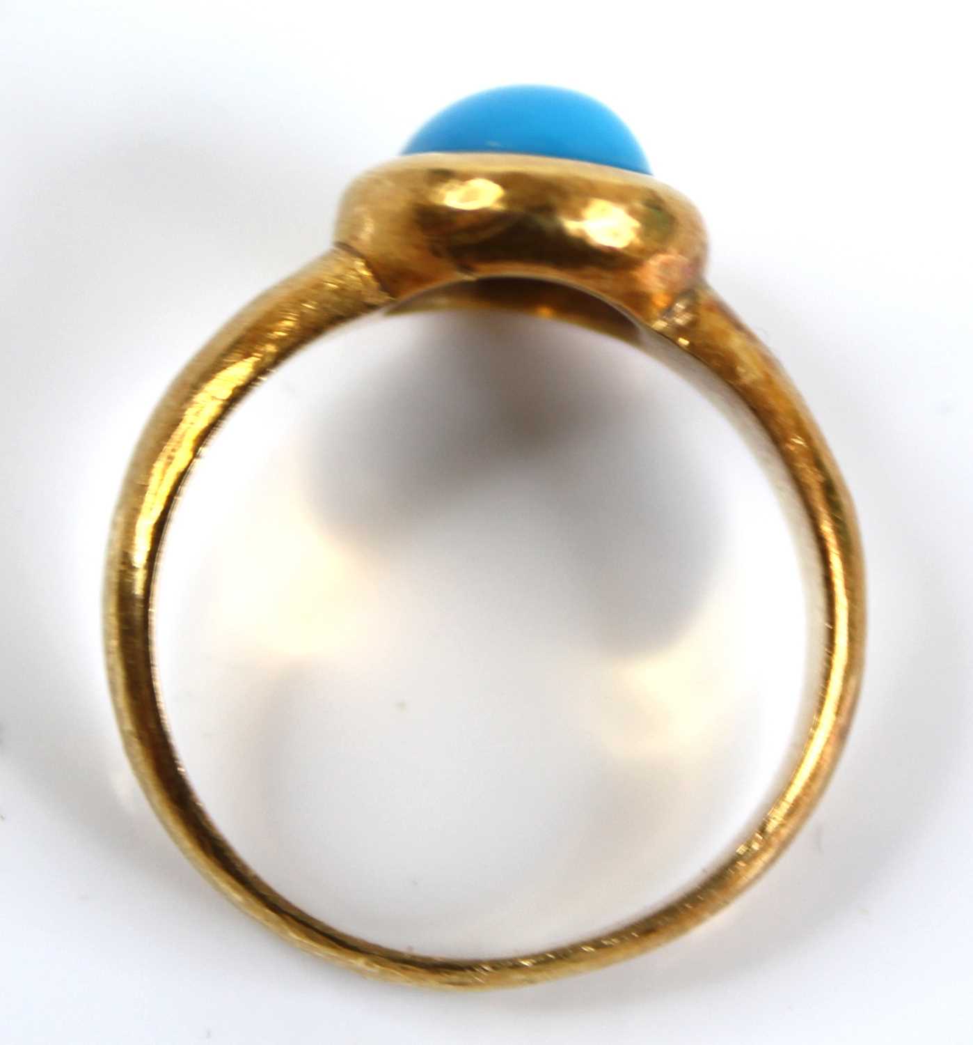 An Arts & Crafts yellow metal cabochon turquoise set dress ring, the turquoise measuring approx 7. - Image 6 of 7