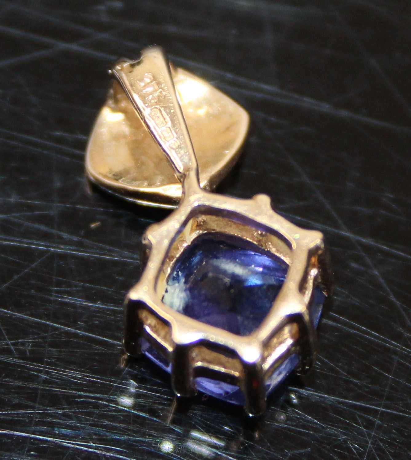 A 9ct gold tanzanite single stone pendant, featuring a cushion cut tanzanite in claw setting, - Image 8 of 9