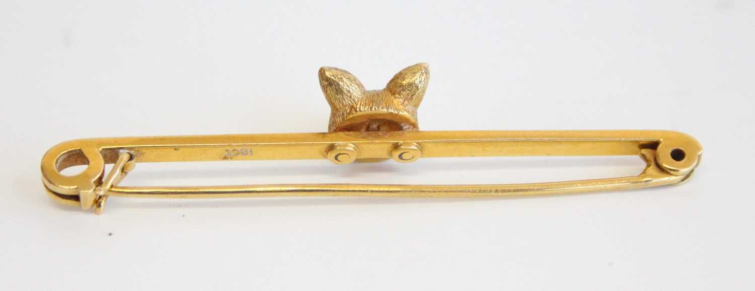 An 18ct gold safety pin bar brooch set with a fox's head, the eyes as two round cut diamonds, - Image 4 of 4