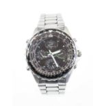 A Seiko Flightmaster 7T34 chronograph watch with centre seconds, four subsidiary dials, and alarm,