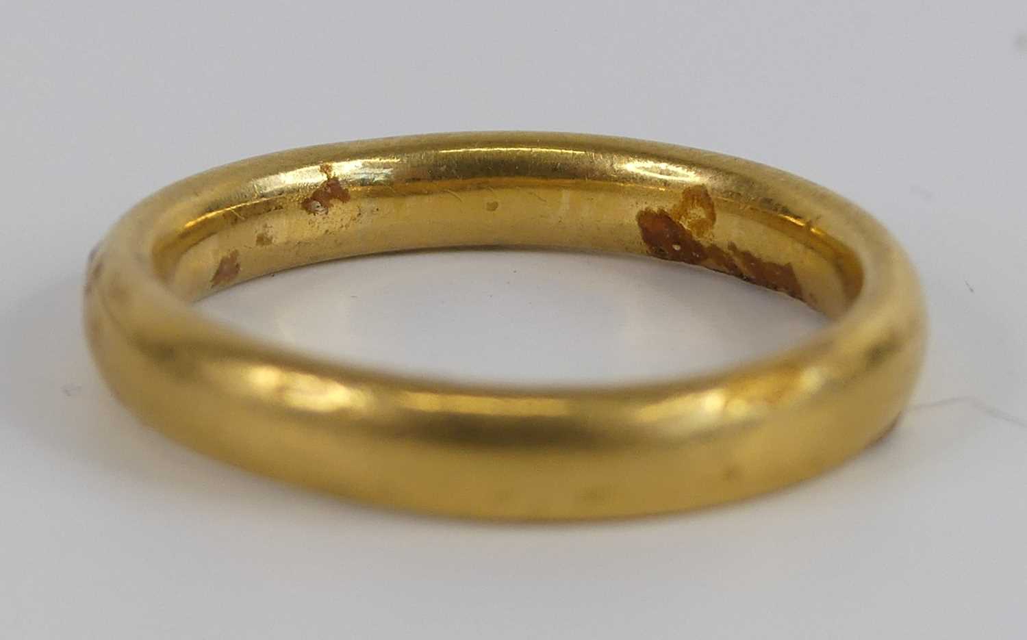 A yellow metal 3.2mm court shaped wedding band, size approx N, gross weight 5.6g, stamped and tested - Image 2 of 6