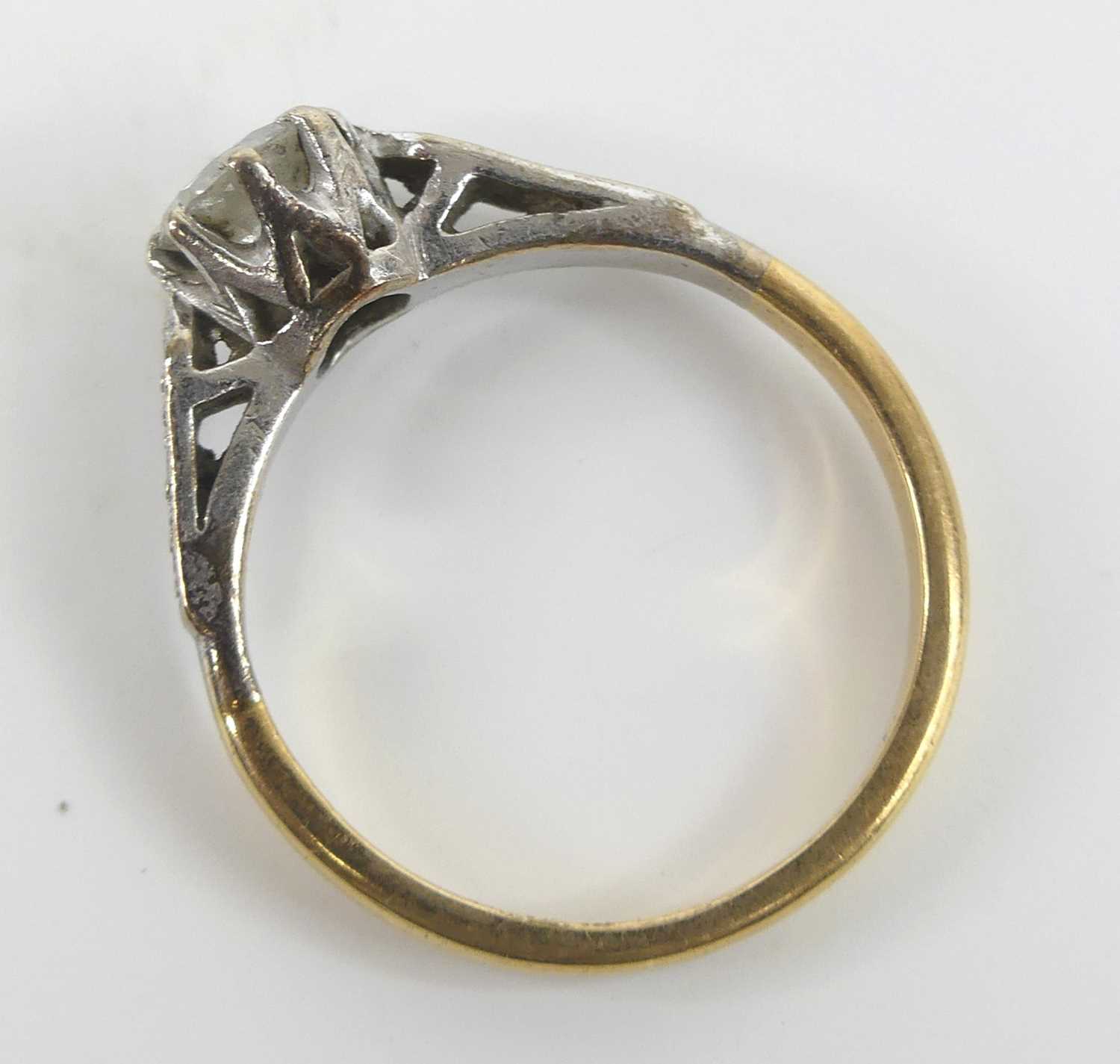 A yellow and white metal, diamond solitaire ring, featuring a round brilliant cut diamond in an - Image 6 of 7