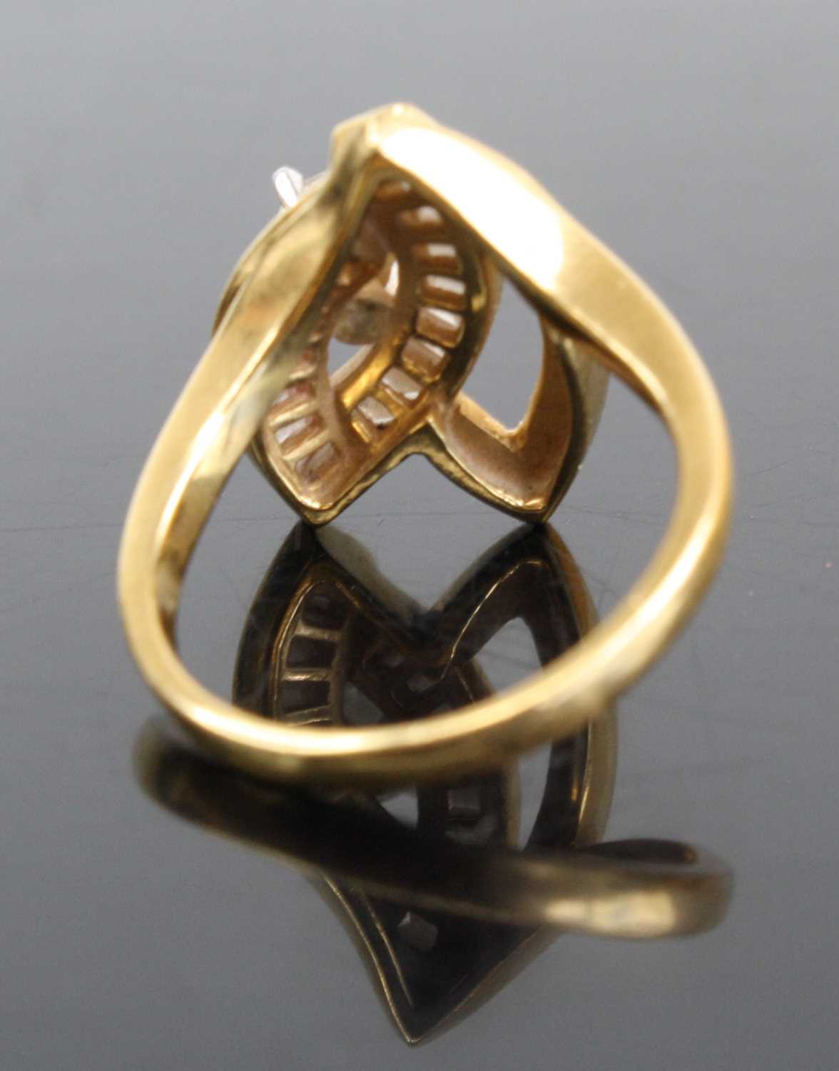 A modern 18ct gold diamond dress ring arranged as a four claw set brilliant, weighing approx 0.3ct - Image 3 of 4