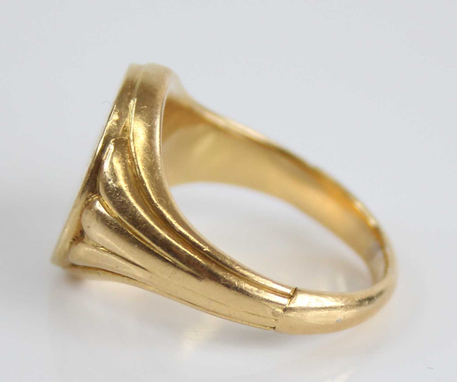 A yellow metal gent's signet ring, the oval top signed Steve, with tapering fluted shoulders, - Image 4 of 6