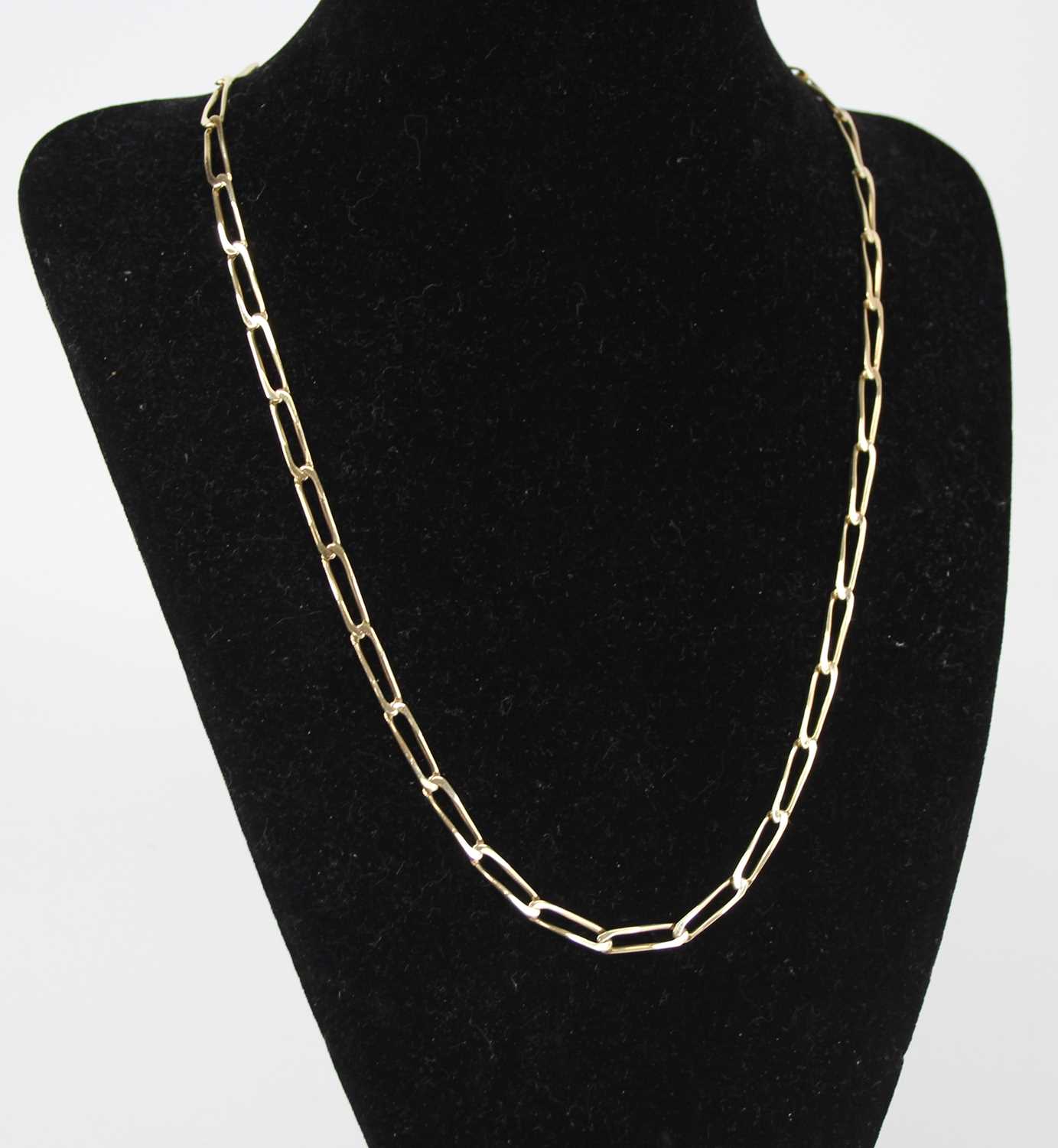 A modern 9ct gold trombone link necklace, 11.8g, 49cm