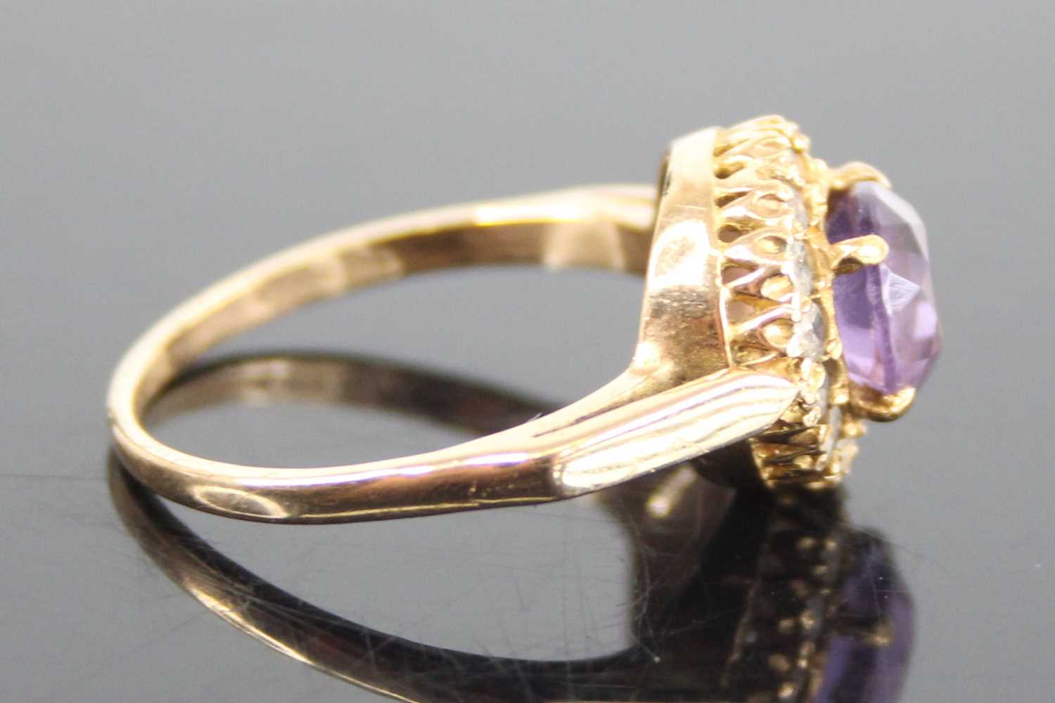A 9ct yellow gold, amethyst and topaz circular cluster ring, having a centre round amethyst within a - Image 3 of 7
