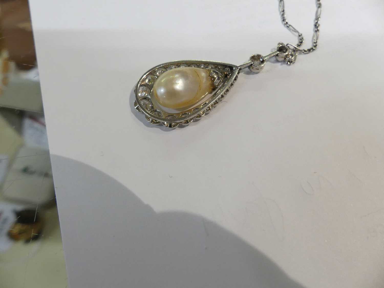 A white metal articulated pearl and diamond pear shaped cluster pendant, comprising a 16.5 x 10.15mm - Image 12 of 14