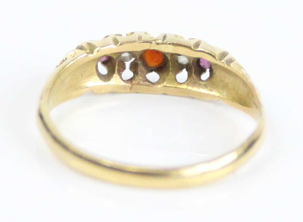 A yellow metal, garnet, diamond and ruby half hoop eternity ring, featuring a centre round garnet - Image 3 of 7