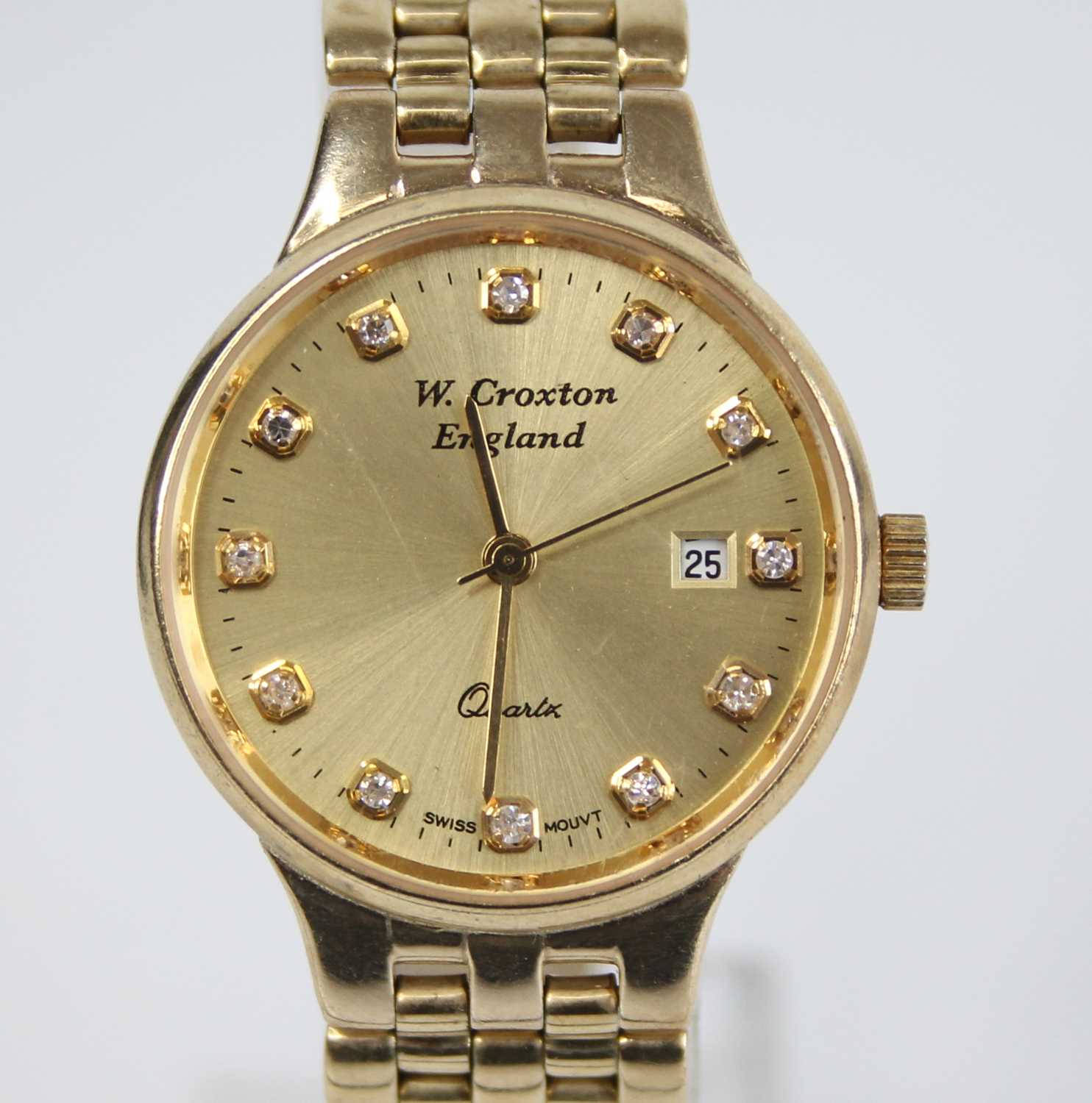 W. Croxton of England - a lady's 9ct gold cased quartz bracelet watch, having a signed gilded