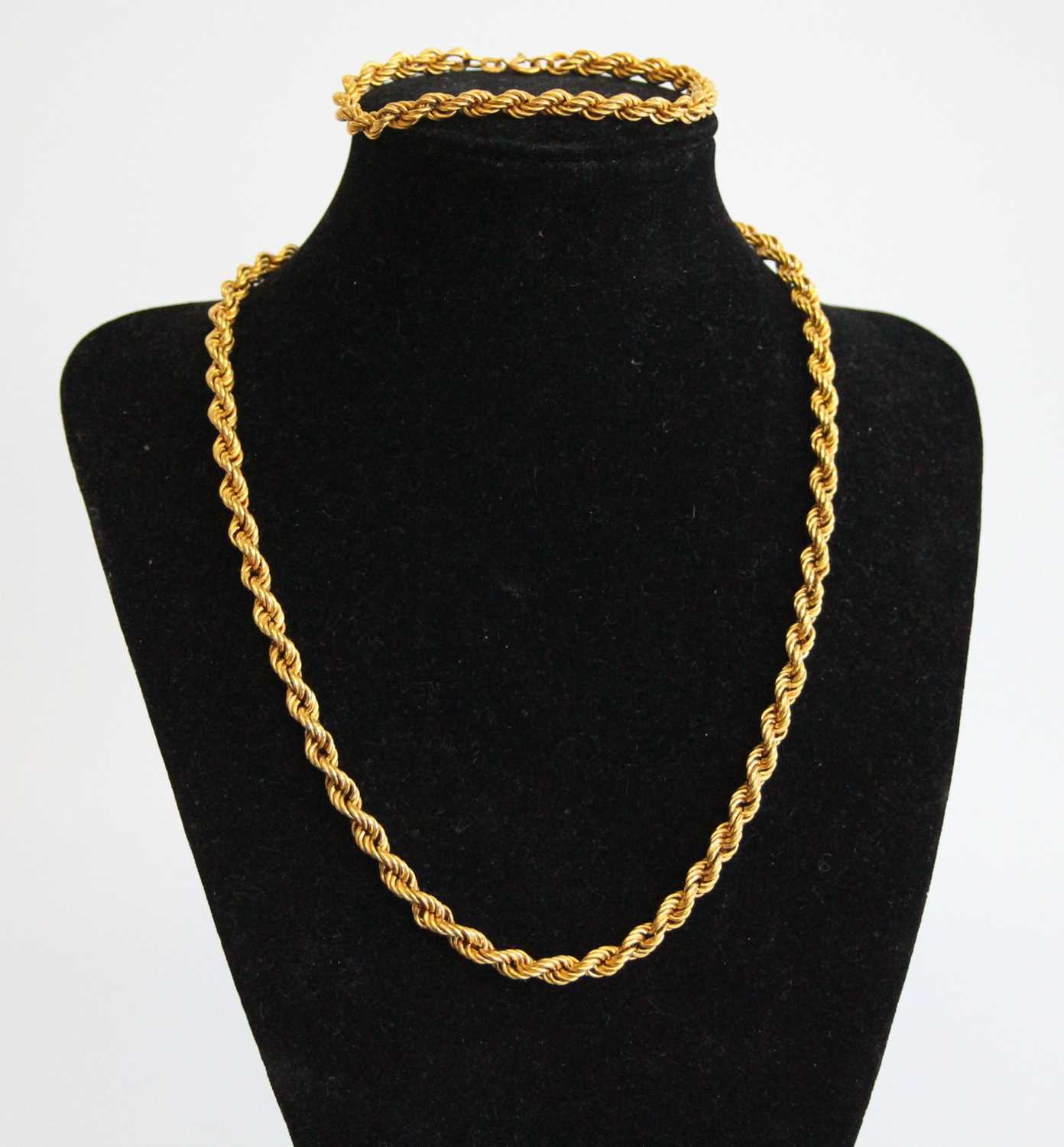 A modern 9ct gold ropetwist necklace, 44cm; together with a matching bracelet, 18.5cm, gross