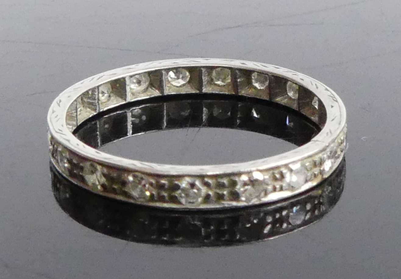A white metal diamond full hoop eternity ring, comprising 19 single cut diamonds in grain and - Image 3 of 5
