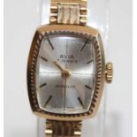 A lady's Avia 9ct gold cased bracelet watch, having incabloc manual wind 17-jewel movement, to an