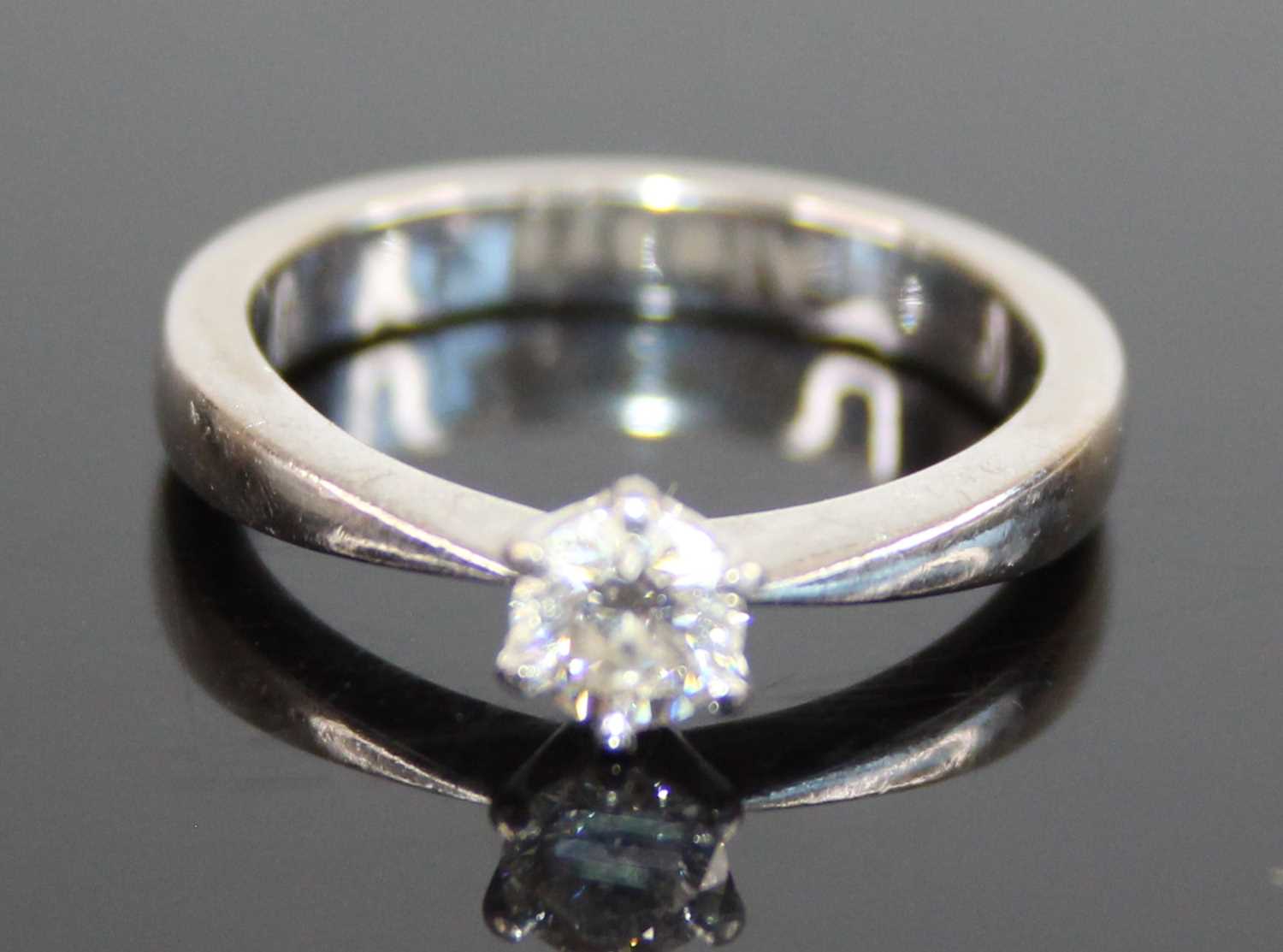 An 18ct white gold diamond solitaire ring, featuring a round brilliant cut diamonds in a six-claw - Image 2 of 6