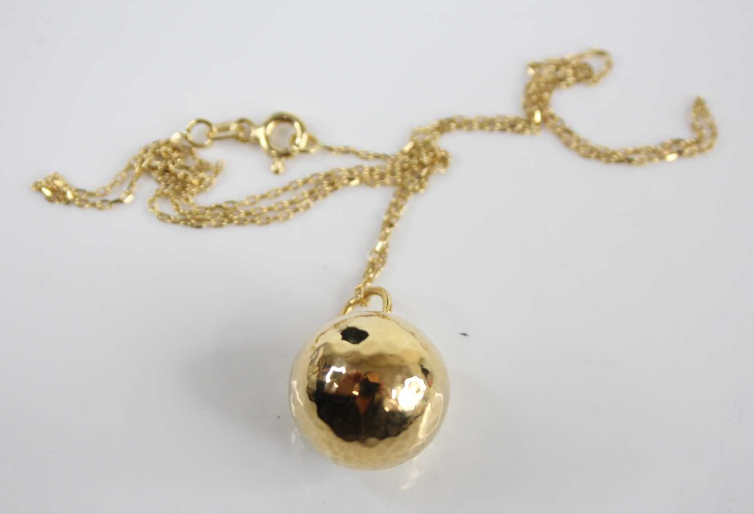 A modern 14ct gold ball pendant, dia.15mm, on finelink gold neck chain, 4.1g - Image 2 of 3