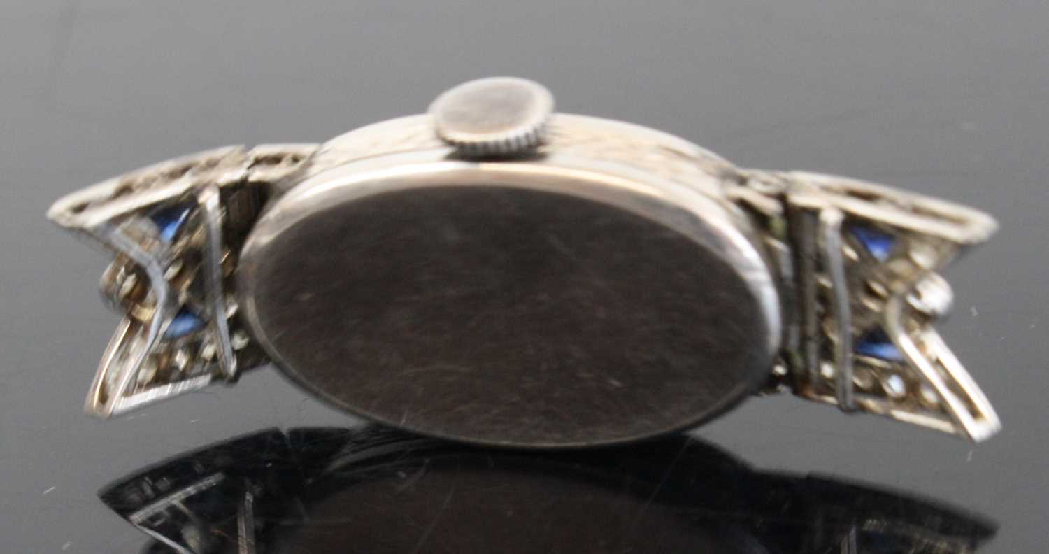 An Art Deco platinum sapphire and diamond set cocktail watch having a signed silvered Arabic dial - Image 5 of 5