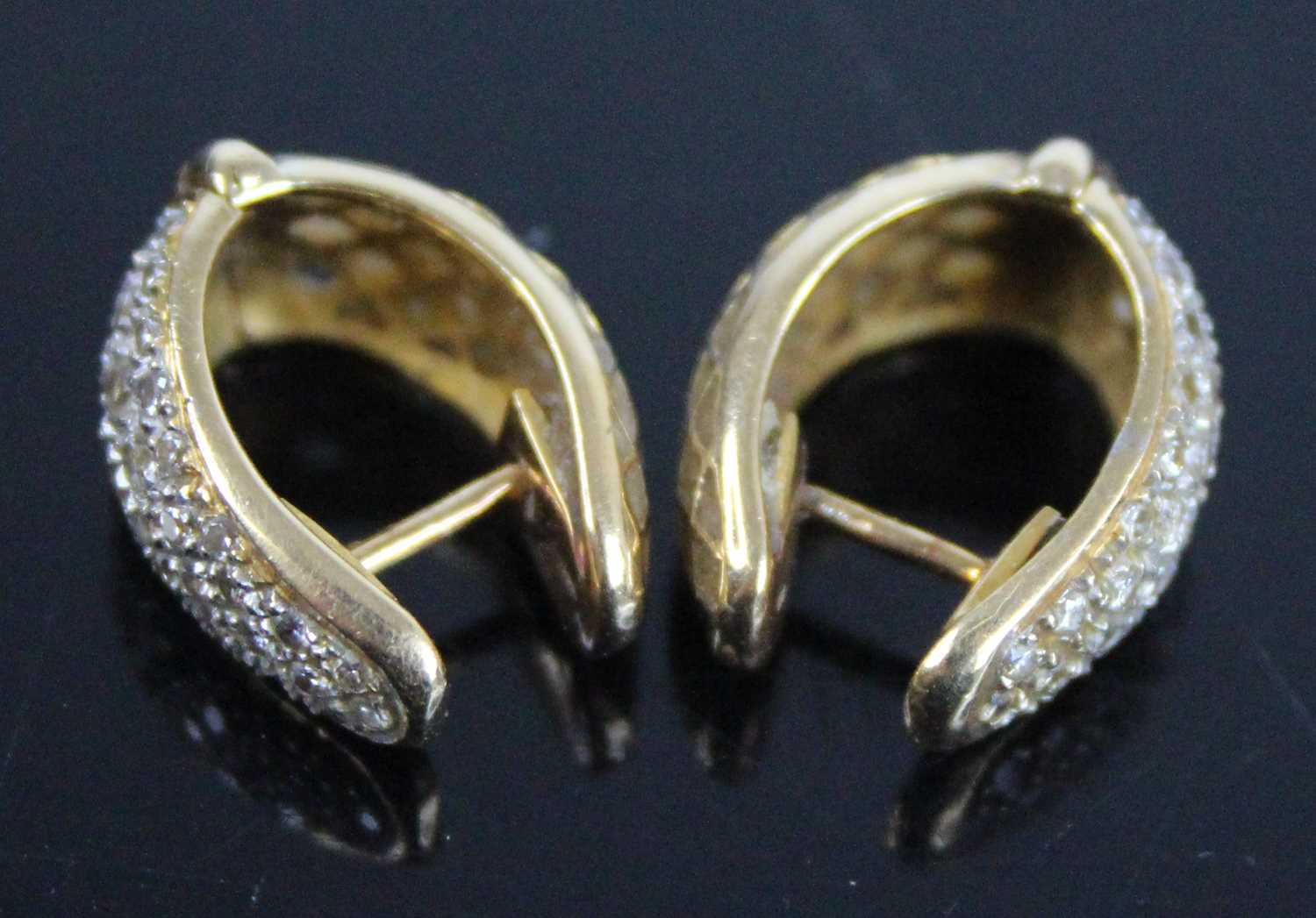 A pair of yellow metal diamond hinged huggy hoop earrings, each with 33 round brilliant cut diamonds - Image 6 of 6