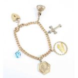 A 9ct rose gold curblink bracelet, with padlock and safety chain, charms attached to include a 9.