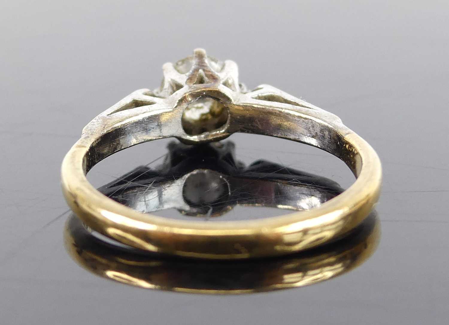 A yellow and white metal, diamond solitaire ring, featuring a round brilliant cut diamond in an - Image 4 of 7