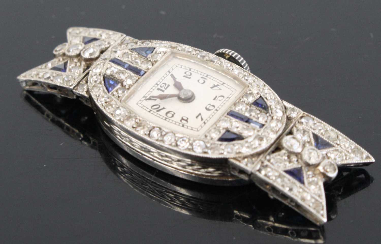 An Art Deco platinum sapphire and diamond set cocktail watch having a signed silvered Arabic dial - Image 3 of 5
