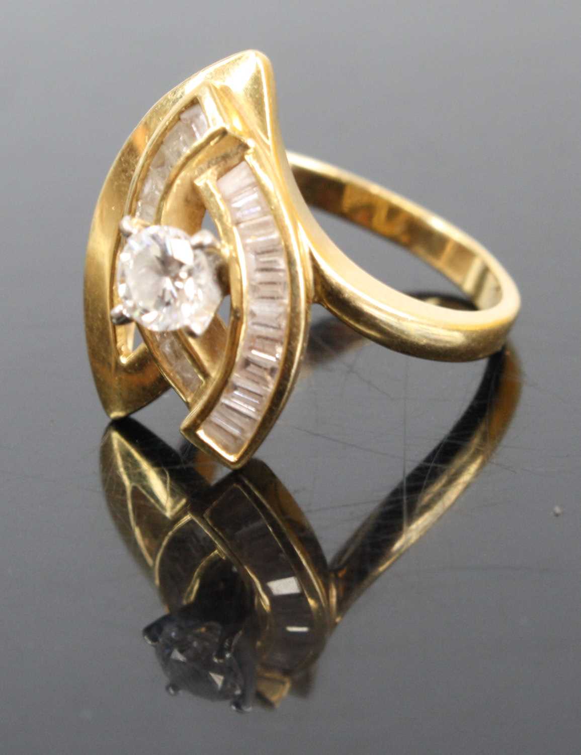 A modern 18ct gold diamond dress ring arranged as a four claw set brilliant, weighing approx 0.3ct - Image 2 of 4