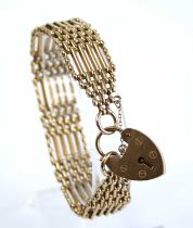 A 9ct gold gatelink bracelet, having heart shaped padlock clasp and safety chain, 27g, 18.5cm