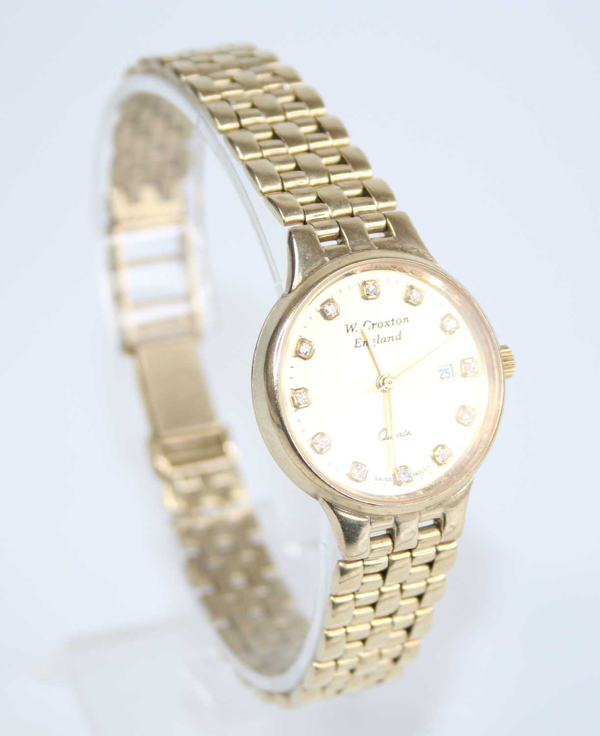 W. Croxton of England - a lady's 9ct gold cased quartz bracelet watch, having a signed gilded - Image 2 of 5