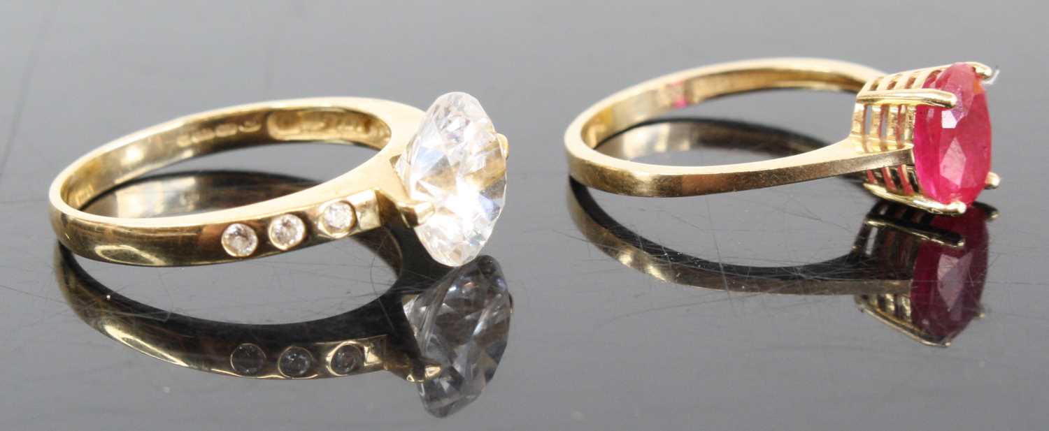 A modern 14ct gold and CZ set solitaire ring, the claw set CZ weighing approx 2.7ct, the shoulders - Image 2 of 3