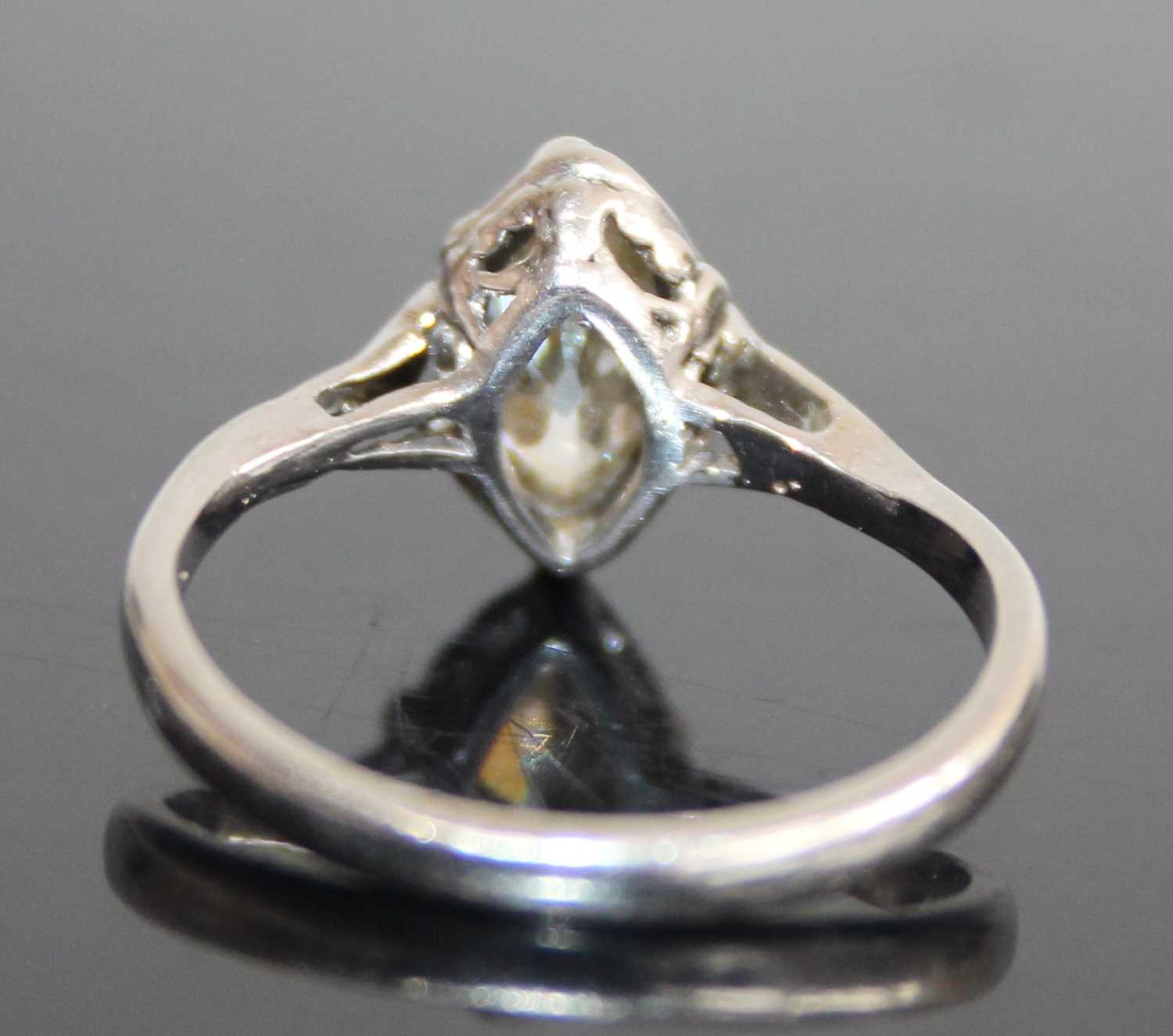 A platinum and diamond single stone ring, the bezel set marquise cut tinted diamond measuring approx - Image 4 of 7