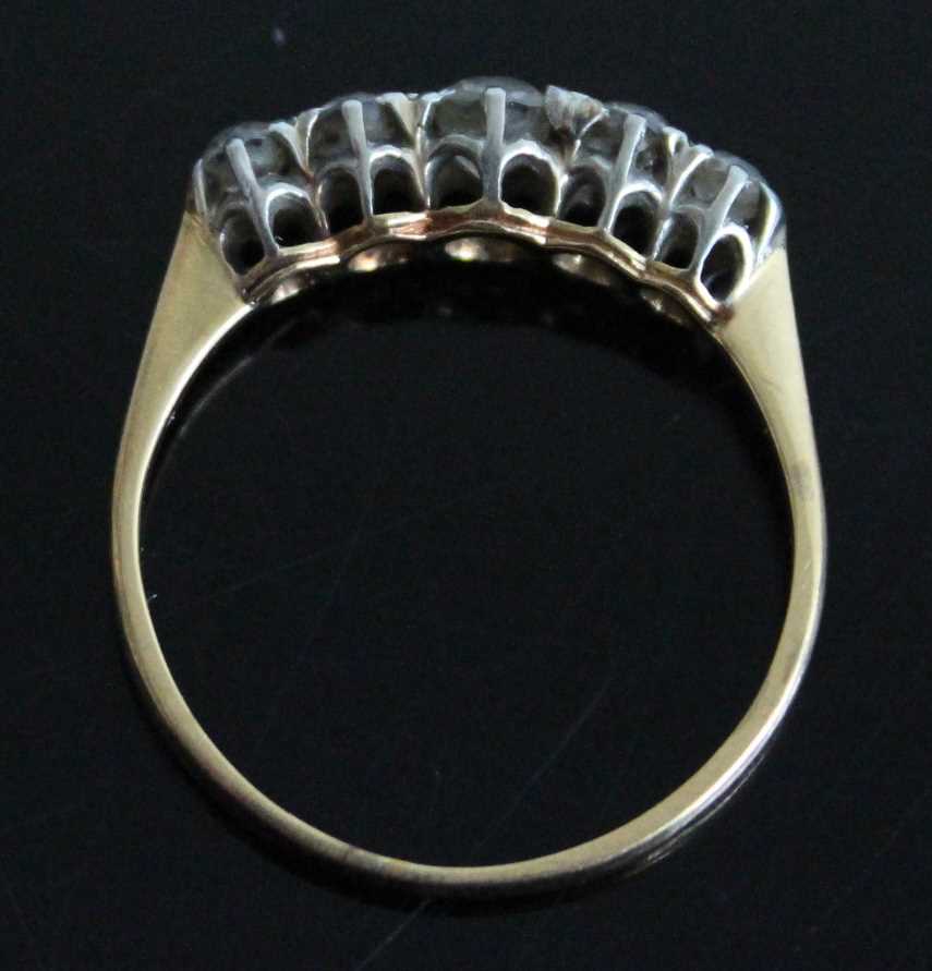 A yellow and white metal diamond half eternity ring, comprising five graduated Old European cut - Image 5 of 6