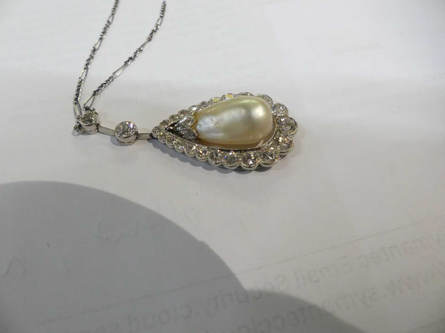 A white metal articulated pearl and diamond pear shaped cluster pendant, comprising a 16.5 x 10.15mm - Image 14 of 14